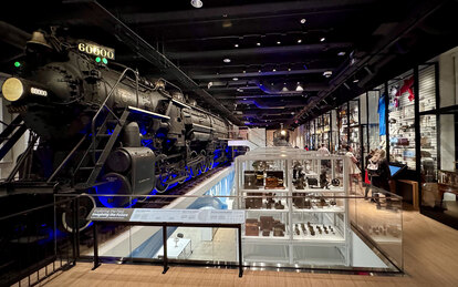 Photo of the Baldwin locomotive on exhibit in a renovated gallery at The Franklin Institute in Philadelphia